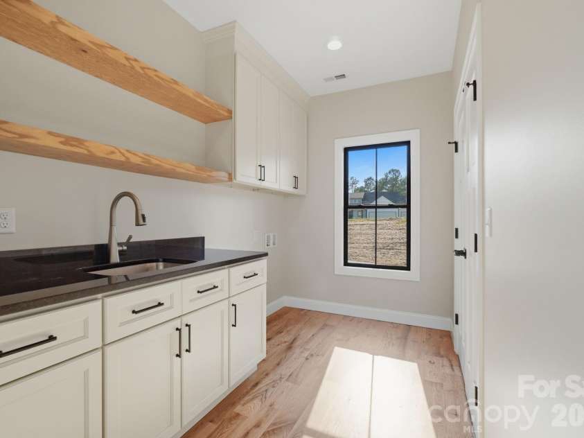 5529 Paddock Way, Granite Falls, NC 28630.  MLS# CAR4404325, YatesRealty ID 41913. Laundry Room with Sink