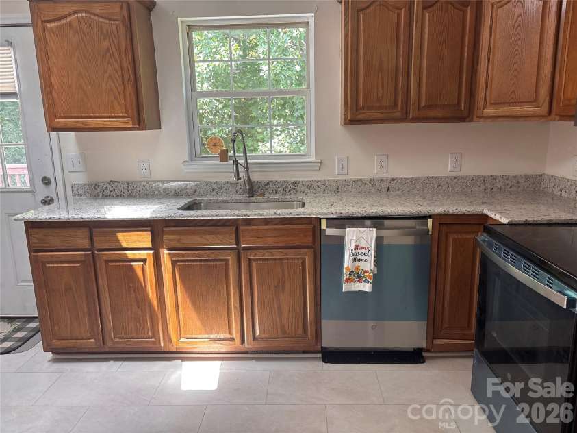 5164 Ralph Winchester Road, Lenoir, NC 28645.  MLS# CAR4346503, YatesRealty ID 41920. New granite countertop and deep kitchen sink with pull down spout