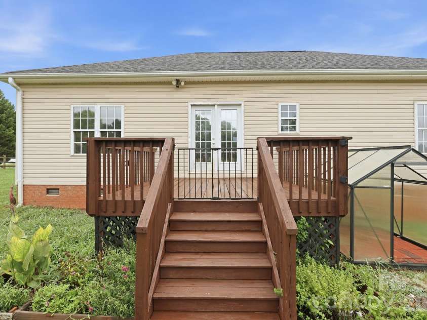 150 Evening Drive, Salisbury, NC 28147.  MLS# CAR4408691, YatesRealty ID 41929. Rear deck over looking fenced in rear yard