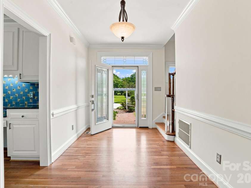6303 Pointe Lane, Rocky Mount, NC 27803.  MLS# CAR4410505, YatesRealty ID 41934. Foyer/front door