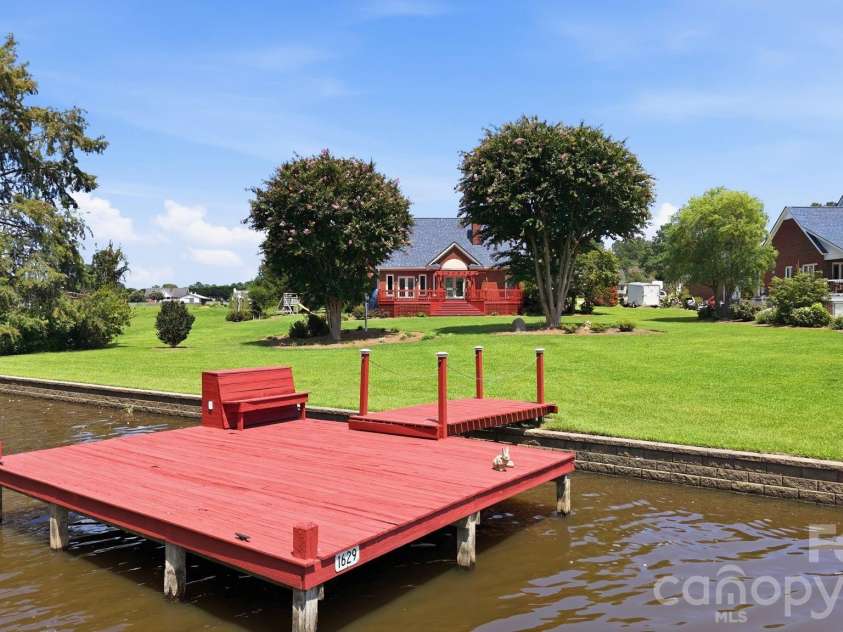 6303 Pointe Lane, Rocky Mount, NC 27803.  MLS# CAR4410505, YatesRealty ID 41934. Private dock
