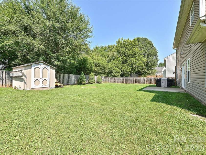 126 Rusty Nail Drive, Mooresville, NC 28115.  MLS# CAR4409612, YatesRealty ID 41936. Back Yard