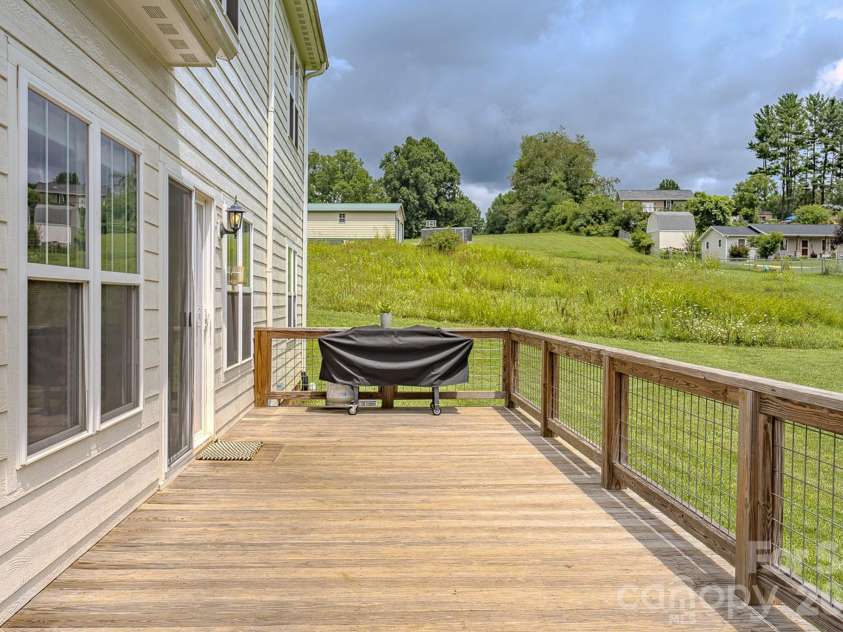 160 Ridge View Drive, Clyde, NC 28721.  MLS# CAR4411209, YatesRealty ID 41946. Back porch
