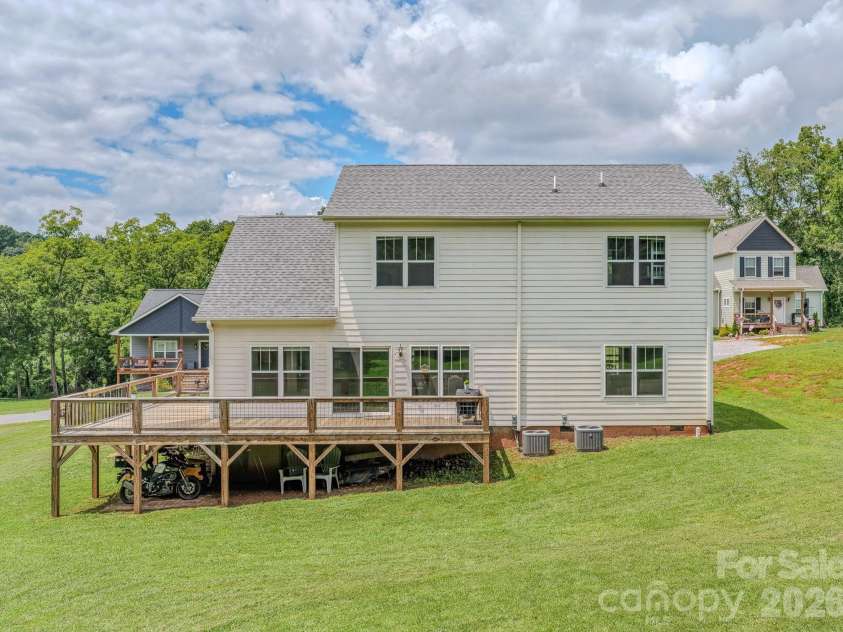 160 Ridge View Drive, Clyde, NC 28721.  MLS# CAR4411209, YatesRealty ID 41946. Back yard