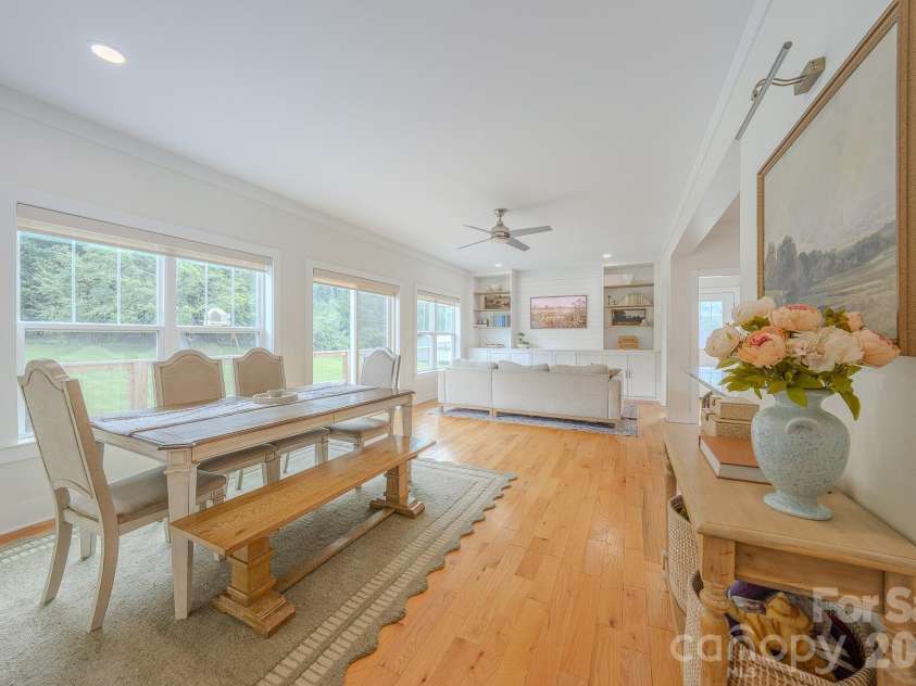 160 Ridge View Drive, Clyde, NC 28721.  MLS# CAR4411209, YatesRealty ID 41946. Dining room and living room
