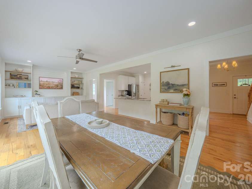 160 Ridge View Drive, Clyde, NC 28721.  MLS# CAR4411209, YatesRealty ID 41946. Dining room, living room and kitchen