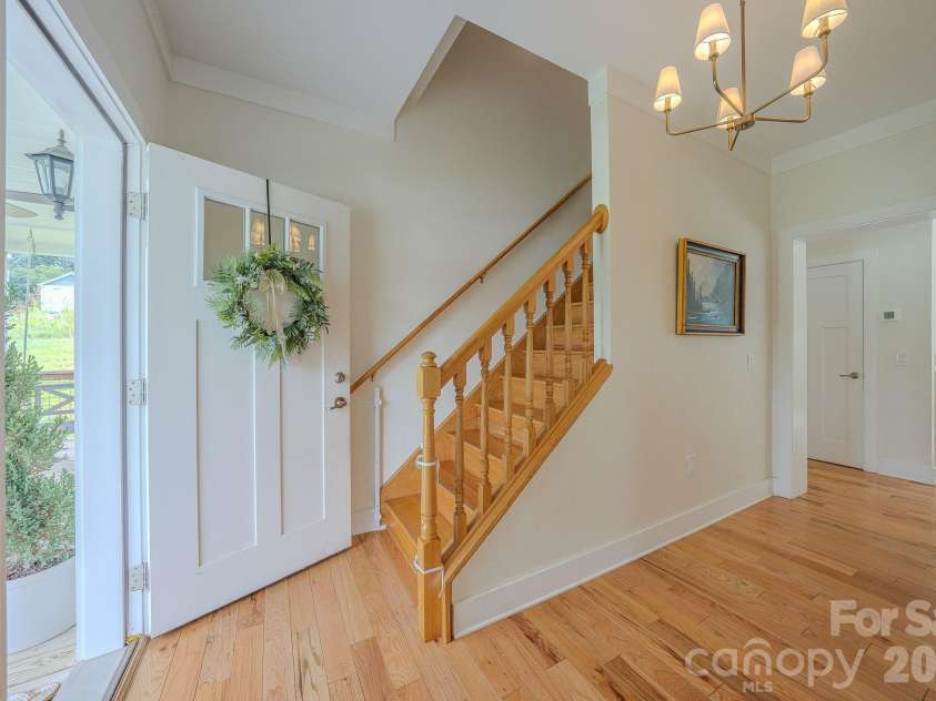 160 Ridge View Drive, Clyde, NC 28721.  MLS# CAR4411209, YatesRealty ID 41946. Foyer, with stairs