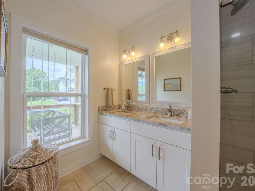 160 Ridge View Drive, Clyde, NC 28721.  MLS# CAR4411209, YatesRealty ID 41946. Primary bathroom