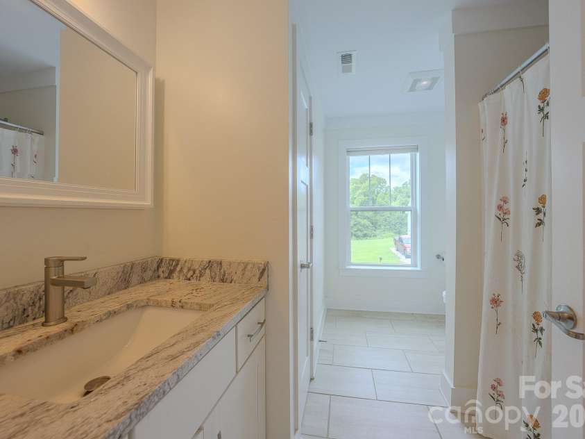 160 Ridge View Drive, Clyde, NC 28721.  MLS# CAR4411209, YatesRealty ID 41946. Second primary bathroomSecond primary bathroom