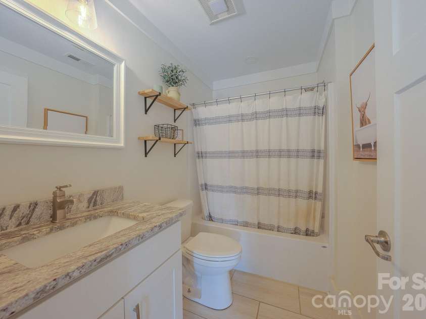 160 Ridge View Drive, Clyde, NC 28721.  MLS# CAR4411209, YatesRealty ID 41946. Upstairs bathroom 2