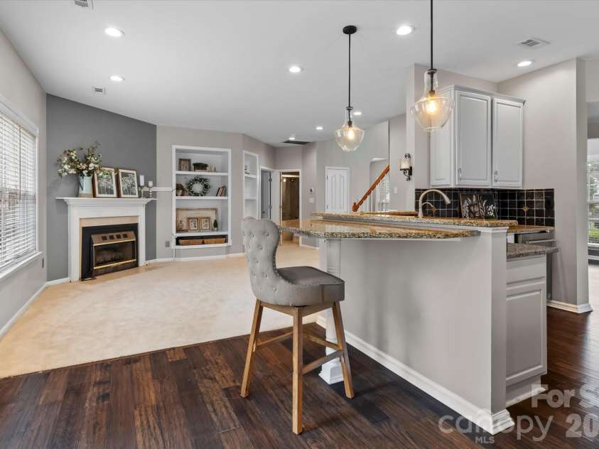 9407 Hillston Ridge Road, Huntersville, NC 28078.  MLS# CAR4398846, YatesRealty ID 41949. Open entertaining kitchen looking into great room.
