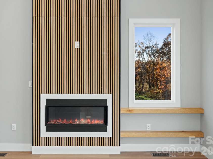 62 Upper Moffitt Road, Asheville, NC 28805.  MLS# CAR4319276, YatesRealty ID 4195. Fireplace