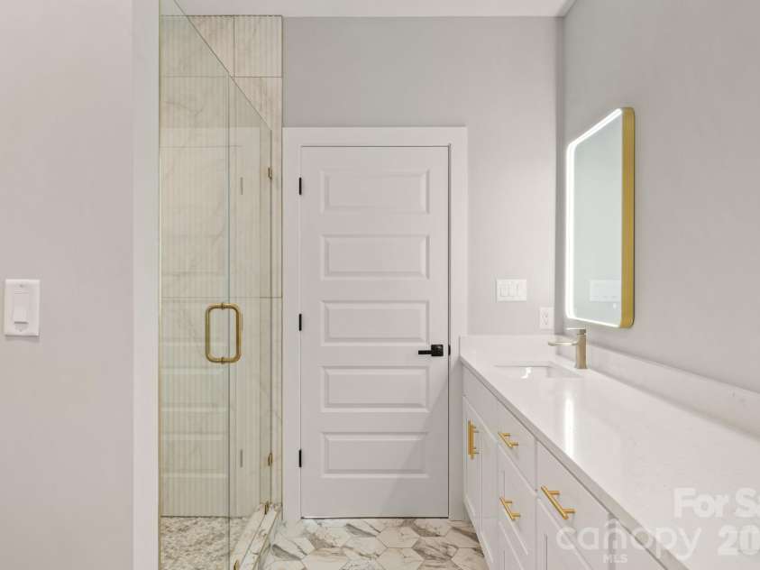 62 Upper Moffitt Road, Asheville, NC 28805.  MLS# CAR4319276, YatesRealty ID 4195. Primary Bathroom