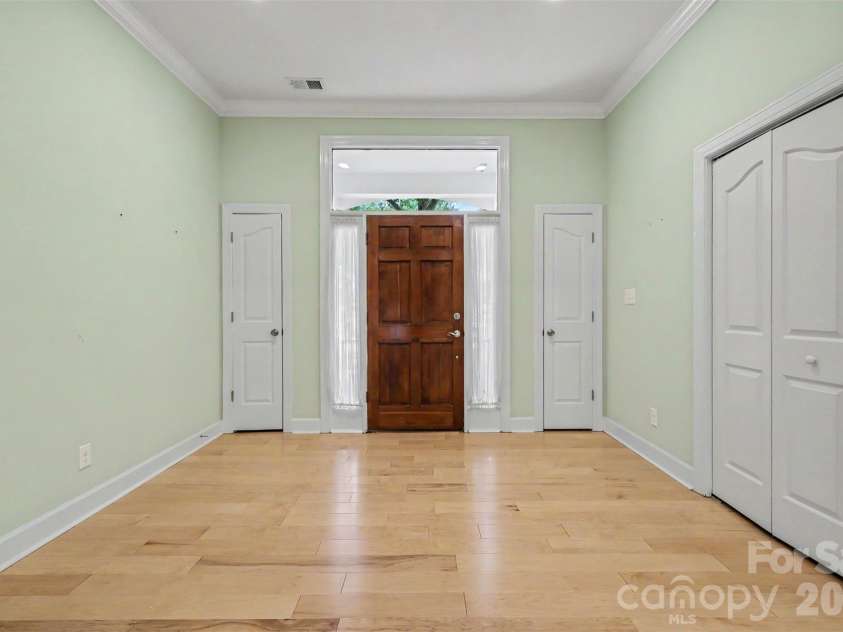 128 Columns Circle, Shelby, NC 28150.  MLS# CAR4395248, YatesRealty ID 41954. A look back at the front door with closets on either side plus a larger bifold coat closet with shelving. There is an abundance of storage in this home!