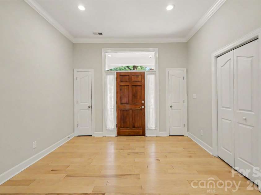128 Columns Circle, Shelby, NC 28150.  MLS# CAR4395248, YatesRealty ID 41954. A look back at the front door with closets on either side plus a larger bifold coat closet with shelving. There is an abundance of storage in this home!