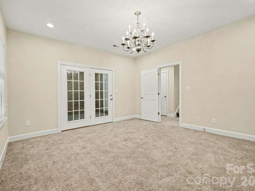 128 Columns Circle, Shelby, NC 28150.  MLS# CAR4395248, YatesRealty ID 41954. Downstairs, there are two additional bedrooms and a bathroom.