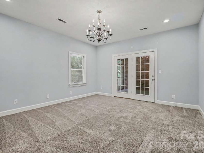 128 Columns Circle, Shelby, NC 28150.  MLS# CAR4395248, YatesRealty ID 41954. Main downstairs bedroom has doors to a screened porch