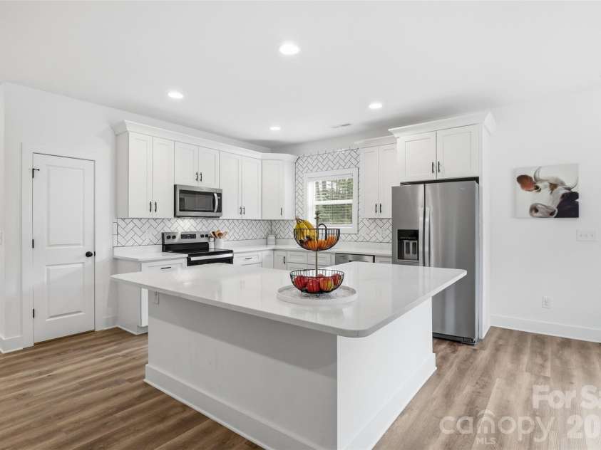 1981 Ripplerock Road, Fort Mill, SC 29715.  MLS# CAR4410148, YatesRealty ID 41974. Beautiful kitchen with large island