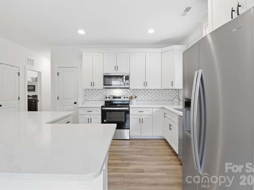 1981 Ripplerock Road, Fort Mill, SC 29715.  MLS# CAR4410148, YatesRealty ID 41974. Designer style backsplash