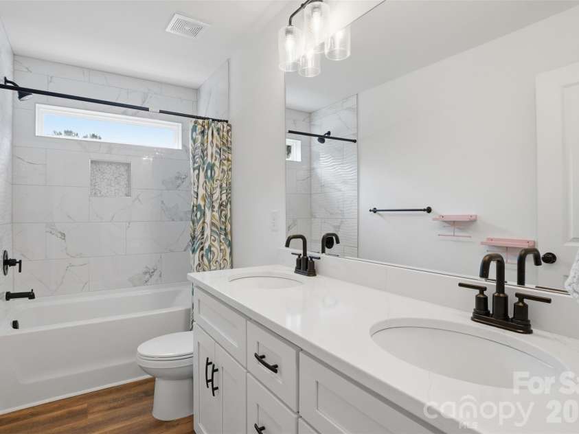 1981 Ripplerock Road, Fort Mill, SC 29715.  MLS# CAR4410148, YatesRealty ID 41974. Full bathroom shared between 3rd and 4th bedrooms