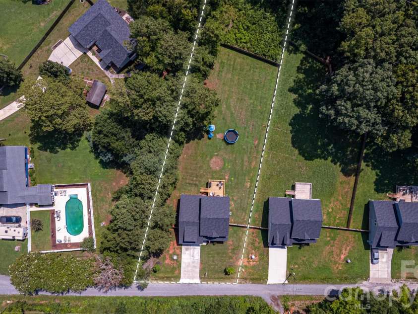 1981 Ripplerock Road, Fort Mill, SC 29715.  MLS# CAR4410148, YatesRealty ID 41974. Large lot!
