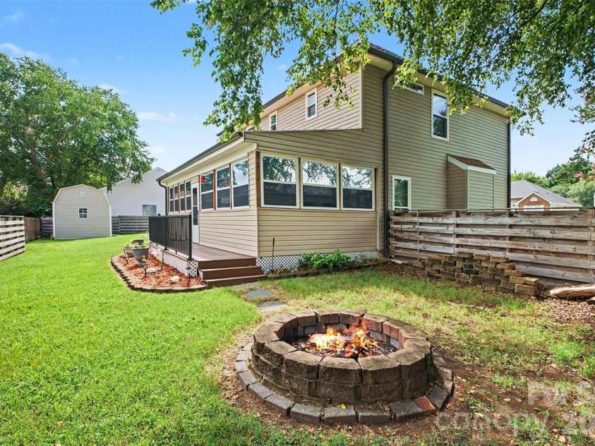 4828 Asherton Place, Concord, NC 28027.  MLS# CAR4411724, YatesRealty ID 41978. Back Yard