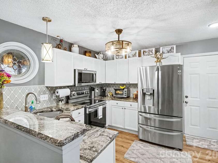 4828 Asherton Place, Concord, NC 28027.  MLS# CAR4411724, YatesRealty ID 41978. Kitchen