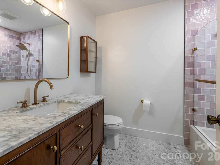 427 Shadowwood Drive, Leicester, NC 28748.  MLS# CAR4292617, YatesRealty ID 4199. Upstairs bath