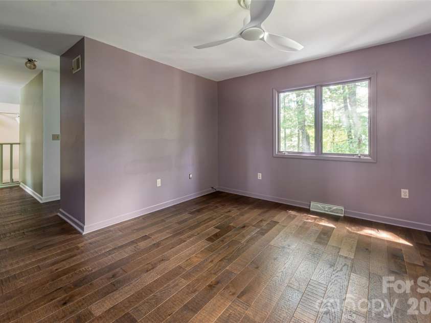 427 Shadowwood Drive, Leicester, NC 28748.  MLS# CAR4292617, YatesRealty ID 4199. Upstairs bedroom