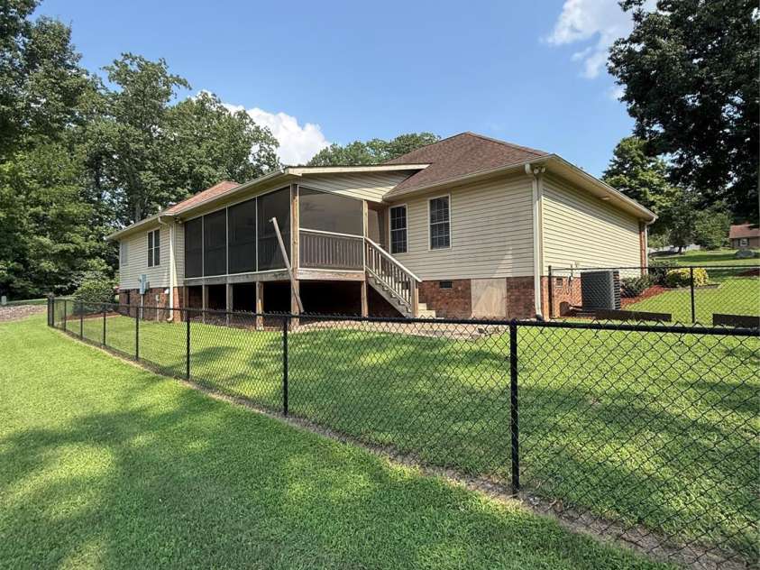 1005 Spring Rock Drive, Salisbury, NC 28146.  MLS# CAR4412191, YatesRealty ID 41998. Back Deck partially fenced in yard