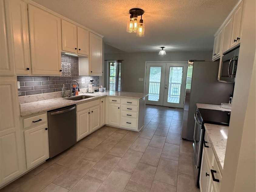 1005 Spring Rock Drive, Salisbury, NC 28146.  MLS# CAR4412191, YatesRealty ID 41998. View of kitchen from breakfast nook