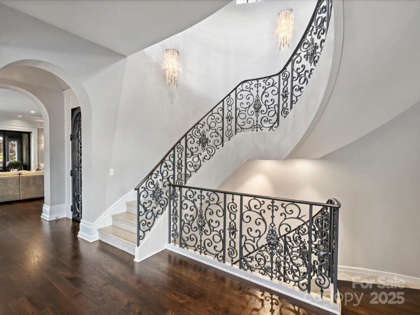 18308 Shearer Road, Davidson, NC 28036.  MLS# CAR4289423, YatesRealty ID 42. Iron Staircase to all three levels