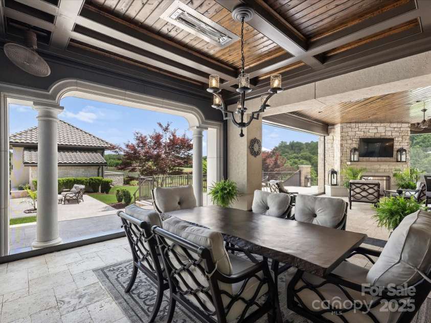 18308 Shearer Road, Davidson, NC 28036.  MLS# CAR4289423, YatesRealty ID 42. Outdoor dining area with retractable screens