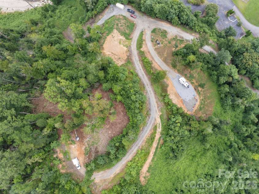213 Three Rivers Drive, Hendersonville, NC 28792.  MLS# CAR4412069, YatesRealty ID 42006. Drone photo showing 5 lots