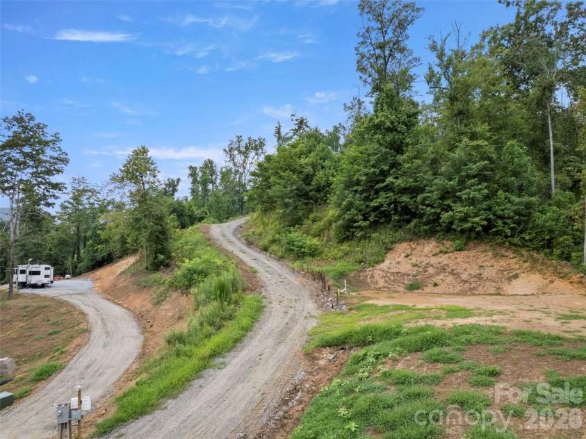 213 Three Rivers Drive, Hendersonville, NC 28792.  MLS# CAR4412069, YatesRealty ID 42006. Trailer to be removed from lot 1