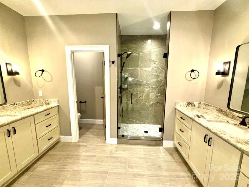 230 Catatoga Path, Brevard, NC 28712.  MLS# CAR4311178, YatesRealty ID 4201. Duak Vanities