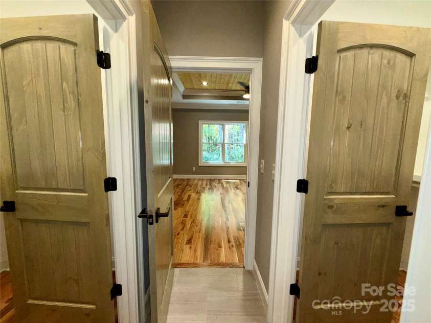 230 Catatoga Path, Brevard, NC 28712.  MLS# CAR4311178, YatesRealty ID 4201. Dual Primary Closets