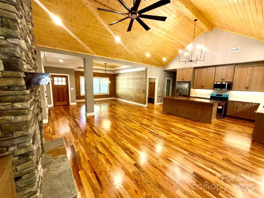 230 Catatoga Path, Brevard, NC 28712.  MLS# CAR4311178, YatesRealty ID 4201. Great Room to Kitchen and Dining Area