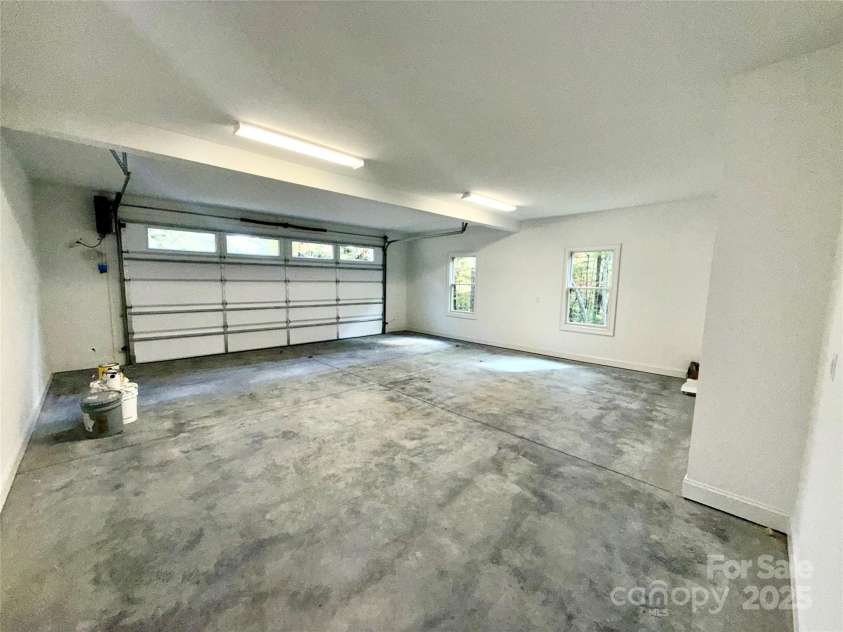 230 Catatoga Path, Brevard, NC 28712.  MLS# CAR4311178, YatesRealty ID 4201. Oversized 2 Car Garage
