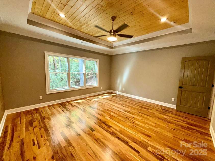 230 Catatoga Path, Brevard, NC 28712.  MLS# CAR4311178, YatesRealty ID 4201. Primary Bedroom with Tray Ceiling