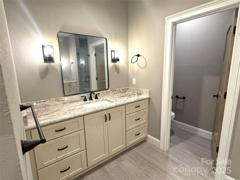 230 Catatoga Path, Brevard, NC 28712.  MLS# CAR4311178, YatesRealty ID 4201. Vanity to Bathroom