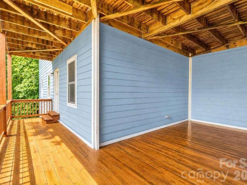 199 Atkins Loop, Lake Junaluska, NC 28745.  MLS# CAR4411136, YatesRealty ID 42010. Lower level deck
