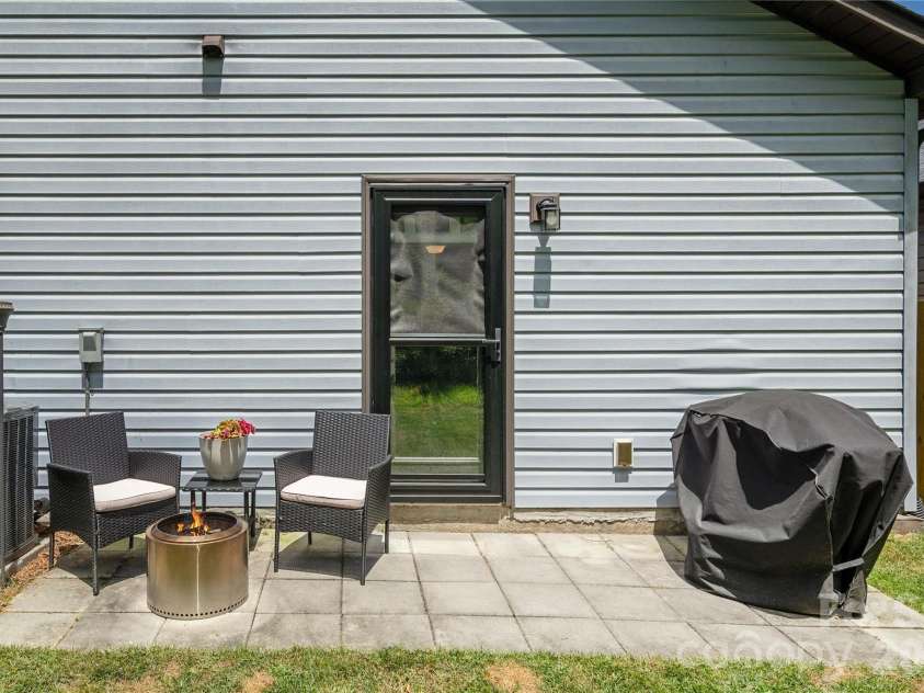 289 Cardwell Lane, Fletcher, NC 28732.  MLS# CAR4412328, YatesRealty ID 42012. Back patio