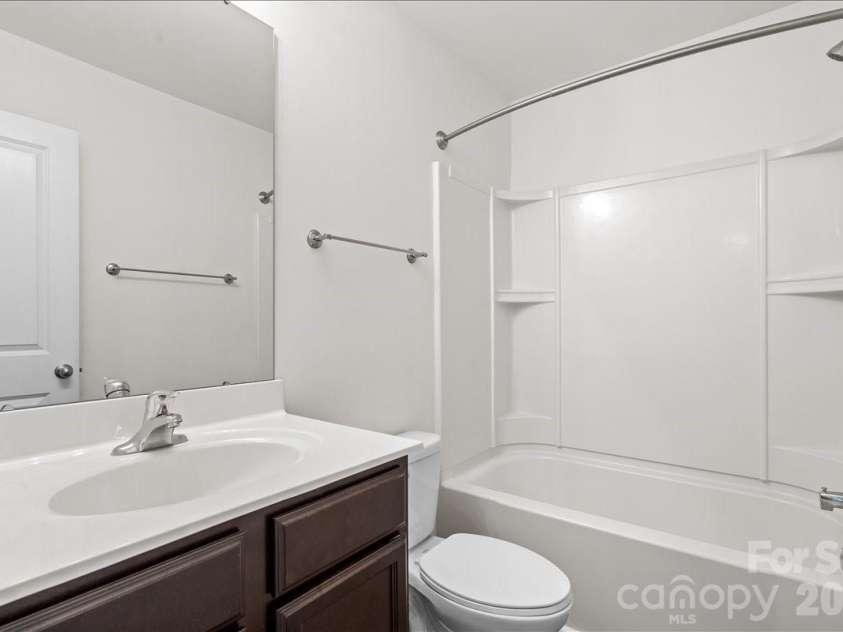 6066 Benedict Place, Indian Land, SC 29707.  MLS# CAR4412443, YatesRealty ID 42017. Guest bathroom