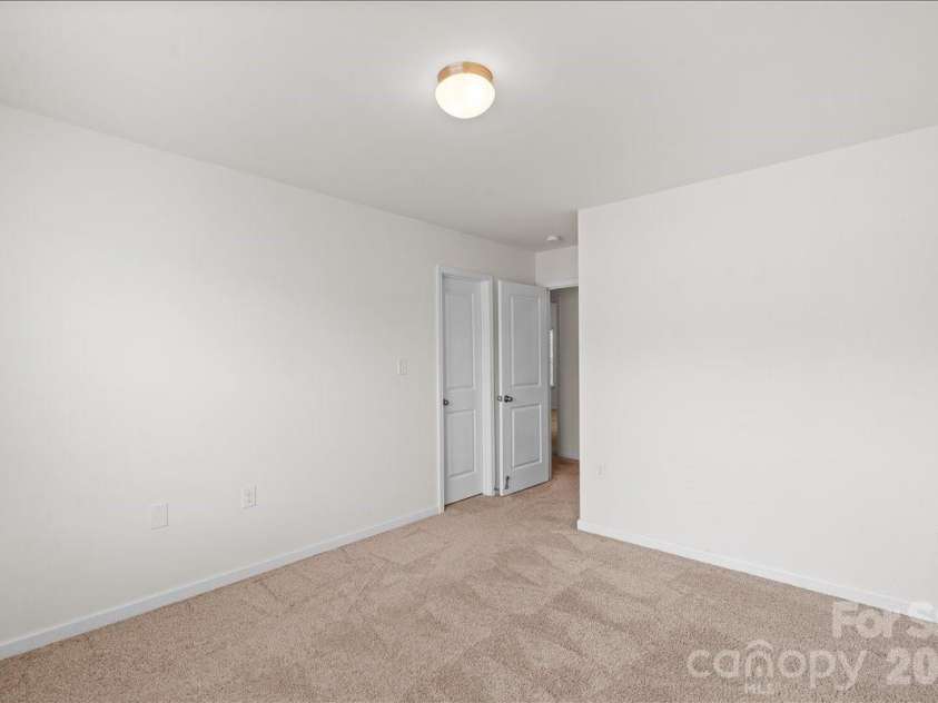 6066 Benedict Place, Indian Land, SC 29707.  MLS# CAR4412443, YatesRealty ID 42017. Guest bedroom