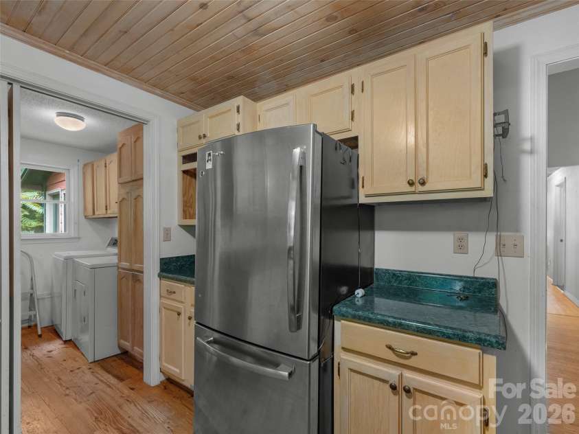 95 Substation Road, Saluda, NC 28773.  MLS# CAR4402765, YatesRealty ID 42020. Kitchen/ laundry room
