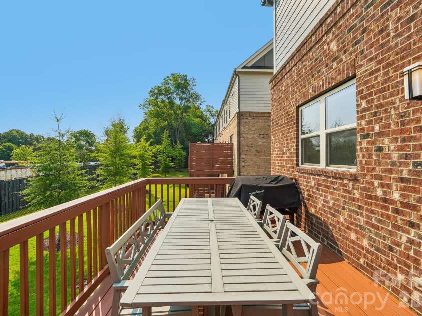 11023 Stetler Street, Charlotte, NC 28204.  MLS# CAR4408205, YatesRealty ID 42027. Deck off Kitchen