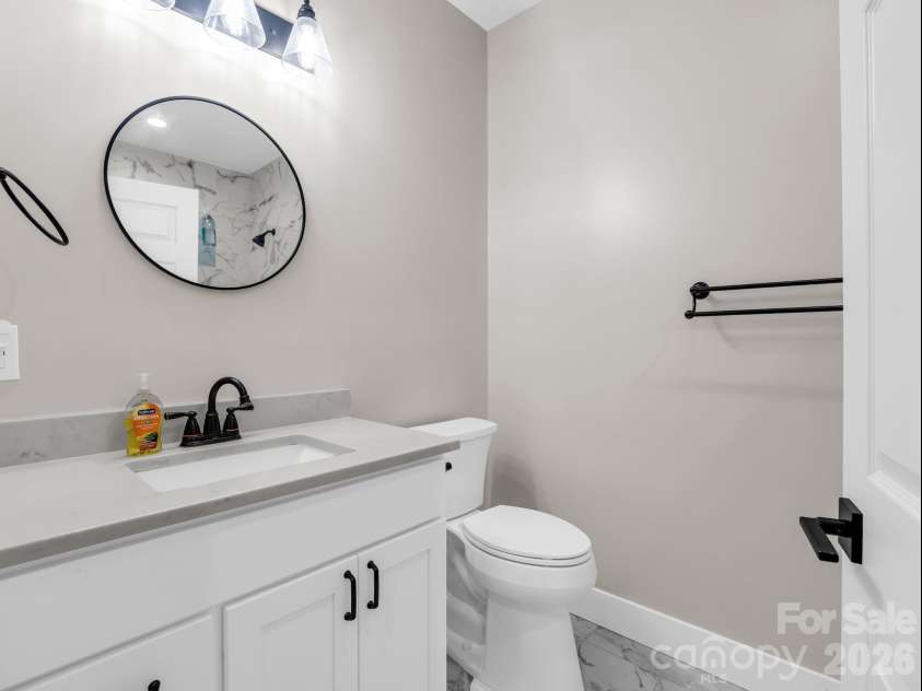 180 Ridgeview Drive, Hendersonville, NC 28792.  MLS# CAR4410645, YatesRealty ID 42029. Primary bath.