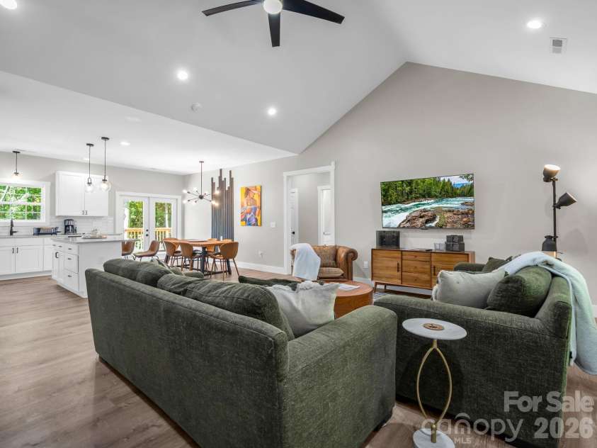 180 Ridgeview Drive, Hendersonville, NC 28792.  MLS# CAR4410645, YatesRealty ID 42029. View from the front door looking back toward the kitchen, dining are and back deck.