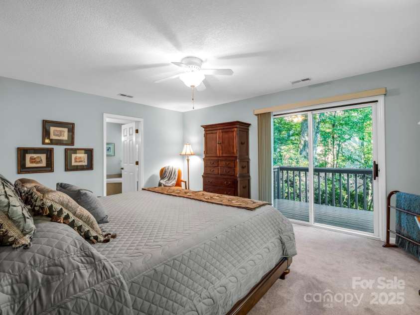 193 Downing Place, Lake Lure, NC 28746.  MLS# CAR4280208, YatesRealty ID 4203. Primary en-suite bedroom.